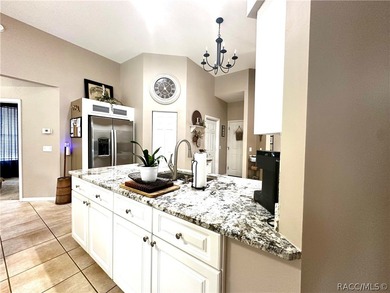 Welcome to this Beautifully maintained 2-bedroom, 2-bath home on Twisted Oaks Golf Club in Florida - for sale on GolfHomes.com, golf home, golf lot