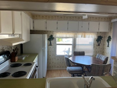 BEAUTIFUL, Well maintained unit in much desired Tamiami Village on Six Lakes Country Club in Florida - for sale on GolfHomes.com, golf home, golf lot