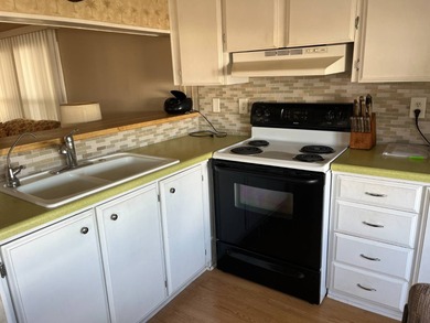 BEAUTIFUL, Well maintained unit in much desired Tamiami Village on Six Lakes Country Club in Florida - for sale on GolfHomes.com, golf home, golf lot