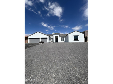BRAND NEW HOME on a spacious lot with a large driveway, block on Arizona City Golf Club in Arizona - for sale on GolfHomes.com, golf home, golf lot