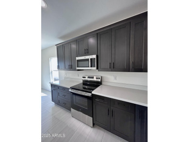 BRAND NEW HOME on a spacious lot with a large driveway, block on Arizona City Golf Club in Arizona - for sale on GolfHomes.com, golf home, golf lot