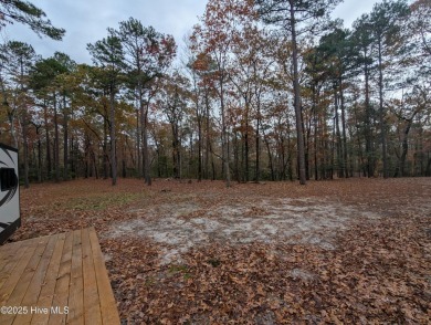 This beautiful, high elevation & fully fenced in lot is located on Minnesott Golf and Country Club in North Carolina - for sale on GolfHomes.com, golf home, golf lot