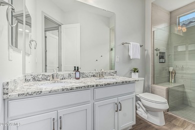 Welcome to Estrella Mountain living at its finest-a former model on Estrella Mountain Ranch Golf Course in Arizona - for sale on GolfHomes.com, golf home, golf lot