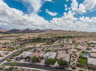 Welcome to Estrella Mountain living at its finest-a former model on Estrella Mountain Ranch Golf Course in Arizona - for sale on GolfHomes.com, golf home, golf lot