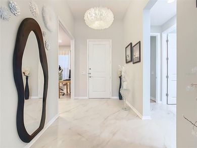 REMODELED & UPDATED Sorano model with 4 BEDROOMS, 3 BATHROOMS on Stonegate Golf Club in Florida - for sale on GolfHomes.com, golf home, golf lot