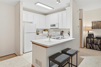 Move right in and enjoy easy Stillwater living with thoughtful on Loggers Trail Golf Club in Minnesota - for sale on GolfHomes.com, golf home, golf lot