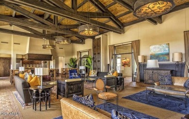 Welcome to Estrella Mountain living at its finest-a former model on Estrella Mountain Ranch Golf Course in Arizona - for sale on GolfHomes.com, golf home, golf lot