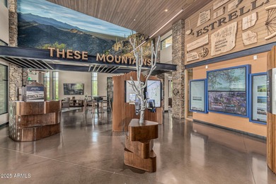 Welcome to Estrella Mountain living at its finest-a former model on Estrella Mountain Ranch Golf Course in Arizona - for sale on GolfHomes.com, golf home, golf lot