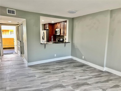 Cash only. Move-in ready 2-bedroom, 2-bathroom condo in a gated on Inverrary Country Club in Florida - for sale on GolfHomes.com, golf home, golf lot