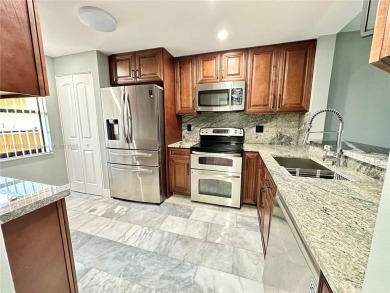 Cash only. Move-in ready 2-bedroom, 2-bathroom condo in a gated on Inverrary Country Club in Florida - for sale on GolfHomes.com, golf home, golf lot