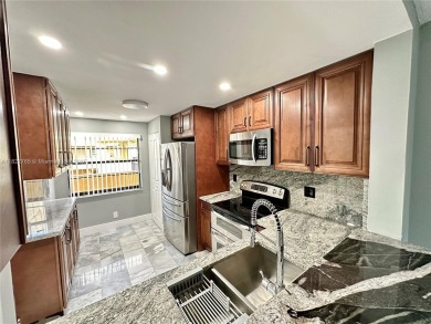Cash only. Move-in ready 2-bedroom, 2-bathroom condo in a gated on Inverrary Country Club in Florida - for sale on GolfHomes.com, golf home, golf lot