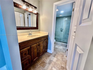 Cash only. Move-in ready 2-bedroom, 2-bathroom condo in a gated on Inverrary Country Club in Florida - for sale on GolfHomes.com, golf home, golf lot
