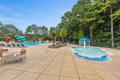 Lovely .68-acre lot perfectly situated at the 11th tee of the on Royal Lakes Golf and Country Club in Georgia - for sale on GolfHomes.com, golf home, golf lot