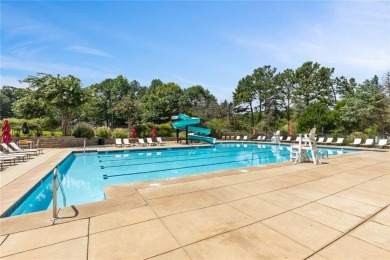 Lovely .68-acre lot perfectly situated at the 11th tee of the on Royal Lakes Golf and Country Club in Georgia - for sale on GolfHomes.com, golf home, golf lot