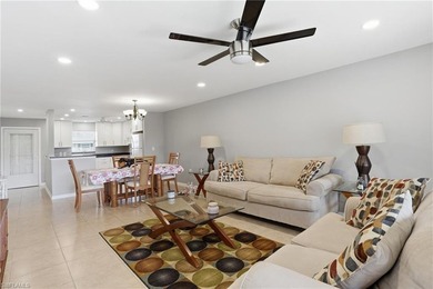 Tastefully renovated split 2 bed 2 bath second floor condo with on Hibiscus Golf Club in Florida - for sale on GolfHomes.com, golf home, golf lot