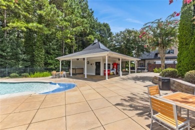 Lovely .68-acre lot perfectly situated at the 11th tee of the on Royal Lakes Golf and Country Club in Georgia - for sale on GolfHomes.com, golf home, golf lot