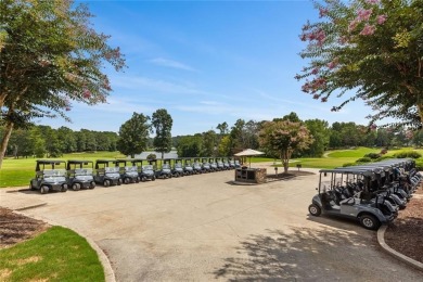 Lovely .68-acre lot perfectly situated at the 11th tee of the on Royal Lakes Golf and Country Club in Georgia - for sale on GolfHomes.com, golf home, golf lot