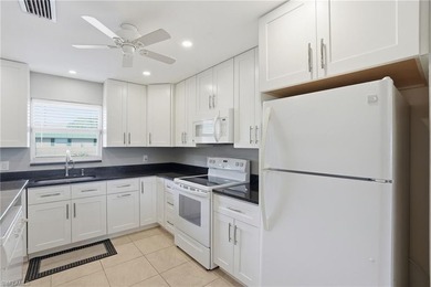 Tastefully renovated split 2 bed 2 bath second floor condo with on Hibiscus Golf Club in Florida - for sale on GolfHomes.com, golf home, golf lot