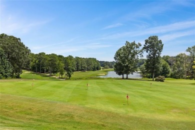 Lovely .68-acre lot perfectly situated at the 11th tee of the on Royal Lakes Golf and Country Club in Georgia - for sale on GolfHomes.com, golf home, golf lot