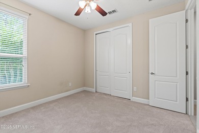 Welcome to this 3-car garage Palencia home with a split on The Palencia Club in Florida - for sale on GolfHomes.com, golf home, golf lot