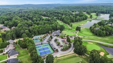 Lovely .68-acre lot perfectly situated at the 11th tee of the on Royal Lakes Golf and Country Club in Georgia - for sale on GolfHomes.com, golf home, golf lot