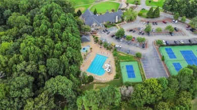 Lovely .68-acre lot perfectly situated at the 11th tee of the on Royal Lakes Golf and Country Club in Georgia - for sale on GolfHomes.com, golf home, golf lot