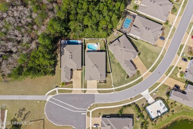 Welcome to this 3-car garage Palencia home with a split on The Palencia Club in Florida - for sale on GolfHomes.com, golf home, golf lot