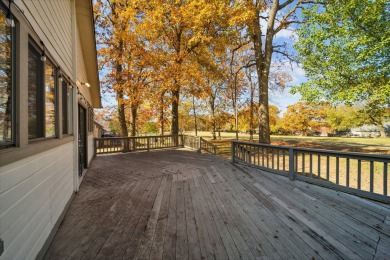 This beautiful stone home sits on the 18th Fairway in The Coves on The Coves Golf Course in Oklahoma - for sale on GolfHomes.com, golf home, golf lot