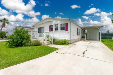 This cute and charming 2 bedroom, 2 bath manufactured home is on Maple Leaf Golf and Country Club in Florida - for sale on GolfHomes.com, golf home, golf lot