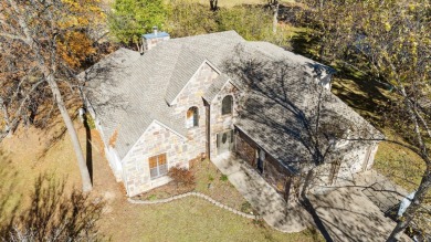 This beautiful stone home sits on the 18th Fairway in The Coves on The Coves Golf Course in Oklahoma - for sale on GolfHomes.com, golf home, golf lot