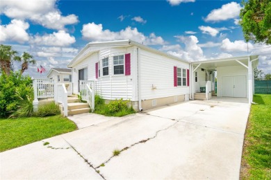 This cute and charming 2 bedroom, 2 bath manufactured home is on Maple Leaf Golf and Country Club in Florida - for sale on GolfHomes.com, golf home, golf lot