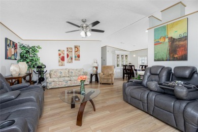 This cute and charming 2 bedroom, 2 bath manufactured home is on Maple Leaf Golf and Country Club in Florida - for sale on GolfHomes.com, golf home, golf lot