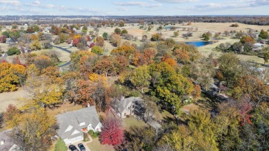 This beautiful stone home sits on the 18th Fairway in The Coves on The Coves Golf Course in Oklahoma - for sale on GolfHomes.com, golf home, golf lot