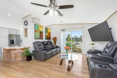 This cute and charming 2 bedroom, 2 bath manufactured home is on Maple Leaf Golf and Country Club in Florida - for sale on GolfHomes.com, golf home, golf lot