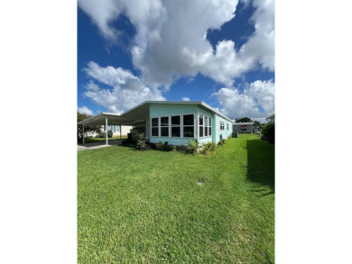 Move-In Ready in a highly sought after active yet peaceful 55+ on Lake Henry Golf Club in Florida - for sale on GolfHomes.com, golf home, golf lot