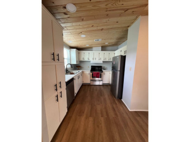Move-In Ready in a highly sought after active yet peaceful 55+ on Lake Henry Golf Club in Florida - for sale on GolfHomes.com, golf home, golf lot