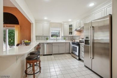 Discover a perfect blend of elegance and ease in this updated on Echo Lake Country Club in New Jersey - for sale on GolfHomes.com, golf home, golf lot