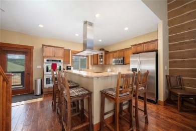 This 5-bedroom 4.5 Bathroom home on .28 acre is a blend of on Headwaters Golf Course At Granby Ranch in Colorado - for sale on GolfHomes.com, golf home, golf lot