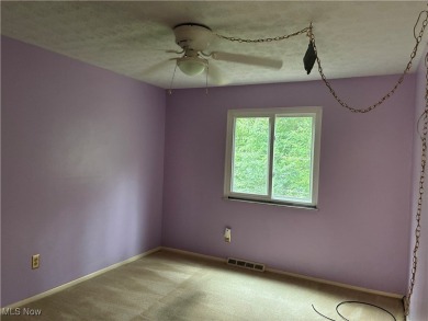 Welcome home to this spacious 3-bedroom, 1.5-bath townhome on Ridgewood Golf Course in Ohio - for sale on GolfHomes.com, golf home, golf lot