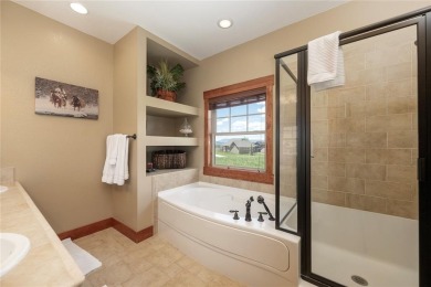 This 5-bedroom 4.5 Bathroom home on .28 acre is a blend of on Headwaters Golf Course At Granby Ranch in Colorado - for sale on GolfHomes.com, golf home, golf lot