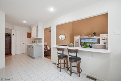 Discover a perfect blend of elegance and ease in this updated on Echo Lake Country Club in New Jersey - for sale on GolfHomes.com, golf home, golf lot