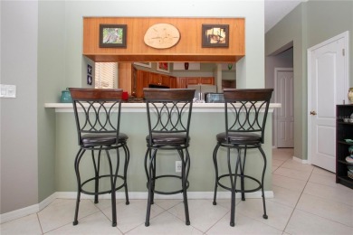 Exceptional pool home with a BRAND NEW TILE ROOF and NEW on The Club Renaissance in Florida - for sale on GolfHomes.com, golf home, golf lot