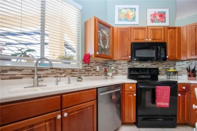 Exceptional pool home with a BRAND NEW TILE ROOF and NEW on The Club Renaissance in Florida - for sale on GolfHomes.com, golf home, golf lot