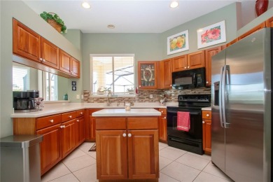 Exceptional pool home with a BRAND NEW TILE ROOF and NEW on The Club Renaissance in Florida - for sale on GolfHomes.com, golf home, golf lot