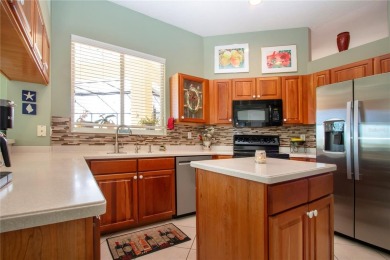 Exceptional pool home with a BRAND NEW TILE ROOF and NEW on The Club Renaissance in Florida - for sale on GolfHomes.com, golf home, golf lot
