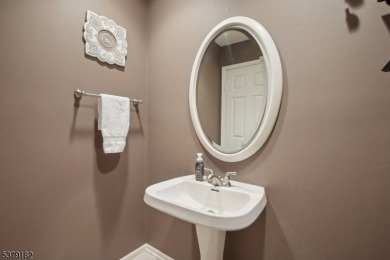 Discover a perfect blend of elegance and ease in this updated on Echo Lake Country Club in New Jersey - for sale on GolfHomes.com, golf home, golf lot