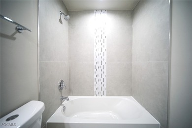 BRAND NEW CONSTRUCTION! You Will Be Amazed By The Quality Of on Mirror Lakes Golf Club in Florida - for sale on GolfHomes.com, golf home, golf lot