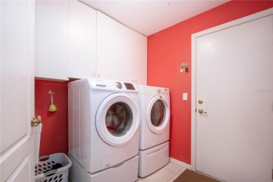 Exceptional pool home with a BRAND NEW TILE ROOF and NEW on The Club Renaissance in Florida - for sale on GolfHomes.com, golf home, golf lot