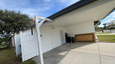 Waterfront Home With Lots Of Upgrades!! Double Wide Carport on Anglers Green Golf Course in Florida - for sale on GolfHomes.com, golf home, golf lot