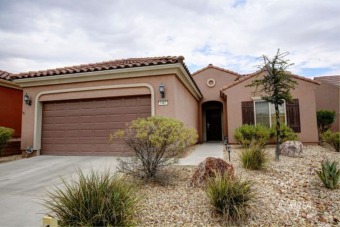 This beautiful home is located on an $80,000 premium lot on Conestoga Golf Club in Nevada - for sale on GolfHomes.com, golf home, golf lot